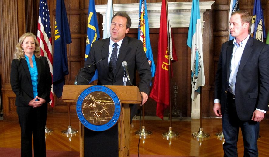 Montana Gov. Steve Bullock (center), Jamie Ryan Lockman (left) of Kamut International and Errol Rice of the Montana Stockgrowers Association discuss an upcoming trade mission to South Korea and Taiwan during a press conference in Helena on Oct. 22, 2015. (Associated Press) **FILE**