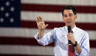 Wisconsin Gov. Scott Walker, who suspended his Republican presidential candidacy, speaks during a town hall meeting in Las Vegas on Sept. 14, 2015. (Associated Press) **FILE**