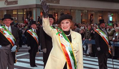 FILE - In this March 17, 1999 file photo, St. Patrick&#x27;s Day Parade Grand Marshal Maureen O&#x27;Hara waves to the people lined up along Fifth Avenue at the annual St. Patrick&#x27;s Day Parade in New York.   O&#x27;Hara,who appeared in such classic films as &amp;quot;The Quiet Man” and How Green Was My Valley,&amp;quot; has died. Her manager says O’Hara died in her sleep Saturday, Oct. 24, 2015 at her home in Boise, Idaho. (AP Photo/Ed Bailey)