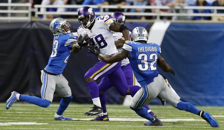 Minnesota Vikings running back Adrian Peterson (28) breaks downfield for a 75-yard run during the second half of an NFL football game against the Detroit Lions, Sunday, Oct. 25, 2015, in Detroit. (AP Photo/Rick Osentoski)