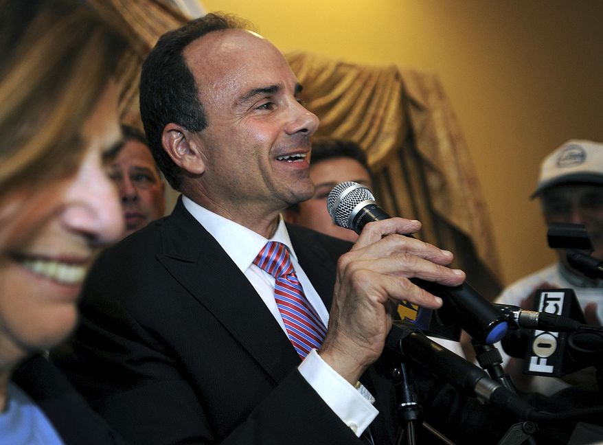FILE - In this Sept. 16, 2015, file photo, former Bridgeport Mayor Joseph Ganim addresses his supporters at Testo's Restaurant in Bridgeport, Conn., after winning the Democratic mayoral primary. Ganim served more than seven years in prison before his 2010 release after being convicted on several counts of public corruption. He faces six opponents, but stands a good chance of winning back his old office in the Nov. 3, 2015, general election. (Brian A. Pounds/Hearst Connecticut Media via AP, File) MANDATORY CREDIT