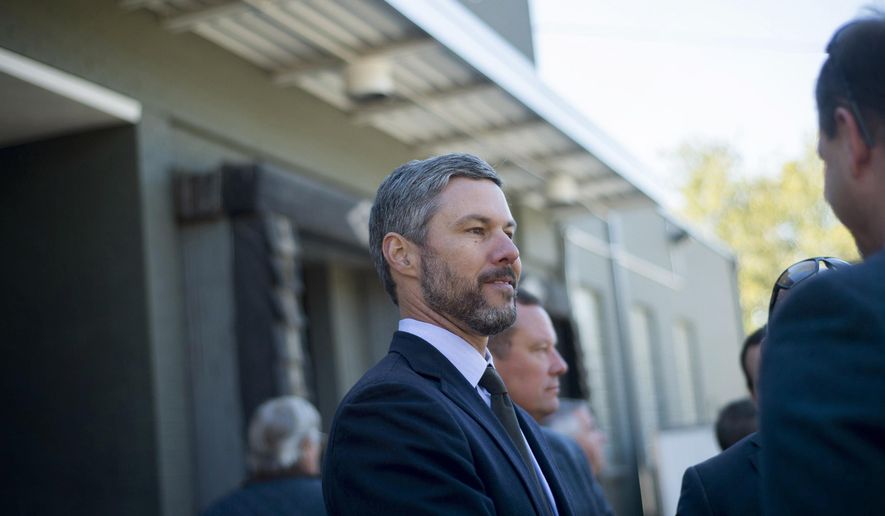 FOR USE ON MONDAY, OCT. 26, 2015 - In this photo taken on Monday, Oct. 19, 2015, Ryan Ford, owner of Seven Hills Food Company, appears at the Grand Opening of the meat processing facility in Lynchburg, Va. The meat processing facility will process Virginia meats for Virginians exclusively. The plant employs 15 people, but that number is expected to increase to nearly 45. (Jill Nance /News & Daily Advance via AP) MANDATORY CREDIT