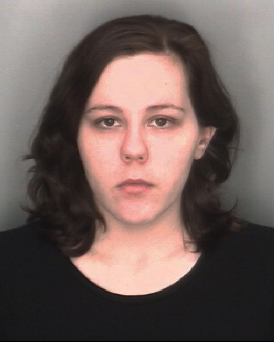 This undated file booking photo released by the Redford Township, Mich., Police Department, shows Kimberly Pappas. The Detroit-area woman, who pleaded guilty to second-degree murder in the death of her newborn son whom she stuffed into a plastic bag after giving birth to him at her suburban Detroit workplace, faces sentencing. (Redford Township Police Department via AP, File)