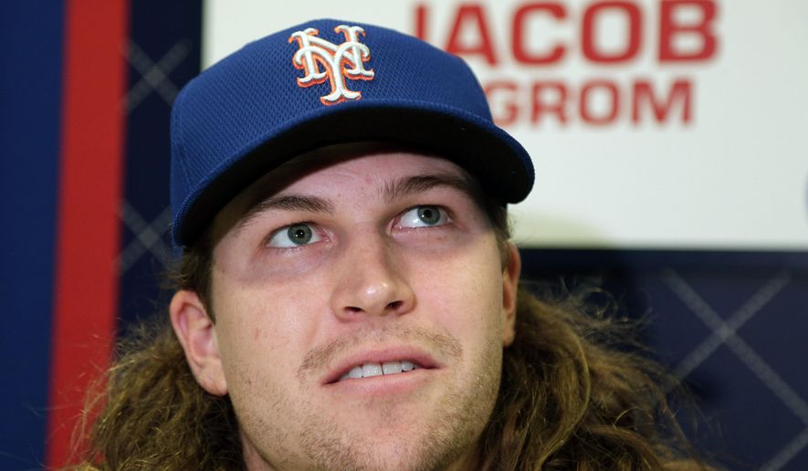 New York Mets starting pitcher Jacob deGrom talks during media day for the Major League Baseball World Series against the Kansas City Royals Monday, Oct. 26, 2015, in Kansas City, Mo. (AP Photo/Charlie Riedel)