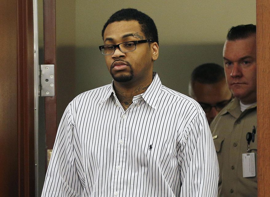 FILE - In this Monday, Oct. 12, 2015 file photo, Ammar Harris walks into court in Las Vegas. Harris was found guilty on Monday of killing three people in a shooting and fiery crash on the Las Vegas Strip in February 2013. Harris sat still and gave no reaction as the verdicts were read in Clark County District Court. (AP Photo/John Locher, File)
