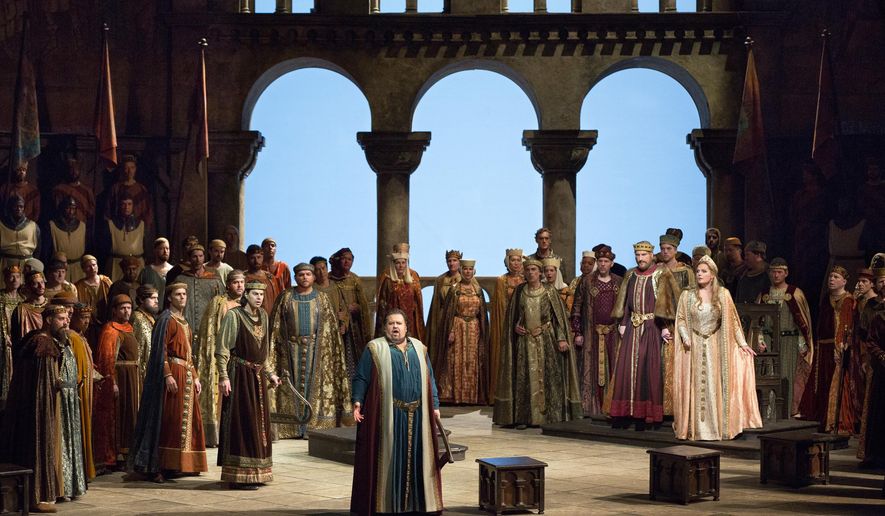 This photo provided by Metropolitan Opera shows Johan Botha, center, in the opera Tannhaeuser. Tannhaeuser is considered one of the most grueling roles in all of opera, yet tenor Botha makes it sound remarkably easy. Audiences worldwide will get to see for themselves on Saturday, Oct. 31, 2015, when the Metropolitan Opera broadcasts Wagner's early masterpiece into movie theaters in HD. (Marty Sohl/Metropolitan Opera via AP)