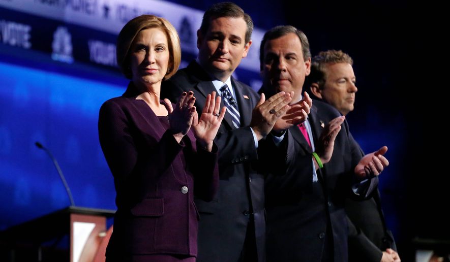 Republican presidential candidates, from left, Carly Fiorina, Ted Cruz, Chris Christie, and Rand Paul take the stage during the CNBC Republican presidential debate at the University of Colorado, Wednesday, Oct. 28, 2015, in Boulder, Colo. (AP Photo/Brennan Linsley)