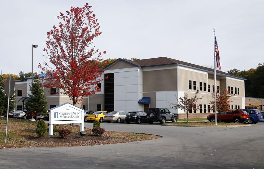 In this Tuesday, Oct. 27, 2015, photo, the Northeast Parent and Child Society is seen in Schenectady, N.Y. The group home was recently investigated by New York's Justice Center regarding the alleged physical and psychological abuse of a 12-year-old boy by caretakers at the home. (AP Photo/Mike Groll)