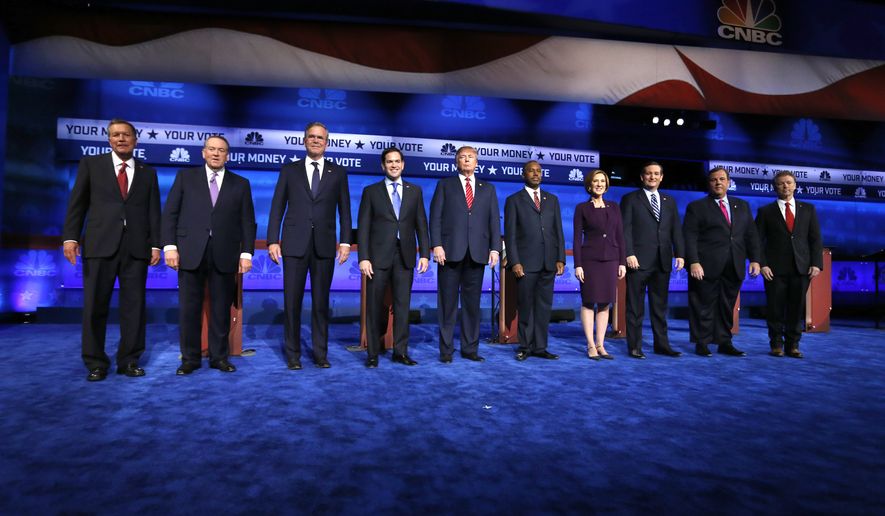 Republican presidential candidates (from left) John Kasich, Mike Huckabee, Jeb Bush, Marco Rubio, Donald Trump, Ben Carson, Carly Fiorina, Ted Cruz, Chris Christie and Rand Paul take the stage during the CNBC Republican presidential debate at the University of Colorado on Wednesday. (Associated Press)