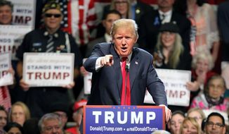 Republican presidential candidate Donald Trump gestures as he speaks during a rally at the Nugget Convention Center Sparks, Nev., Thursday, Oct. 29, 2015. (AP Photo/Lance Iversen) ** FILE **