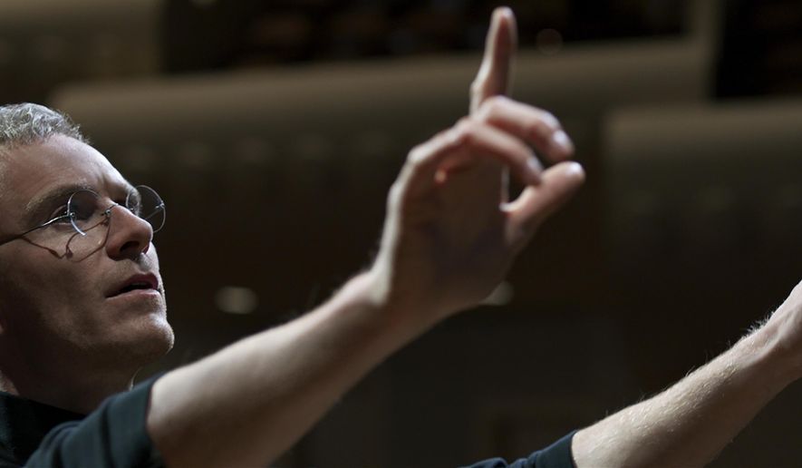 In this image released by Universal Pictures, Michael Fassbender appears as Steve Jobs in a scene from the film, "Steve Jobs." (Universal Pictures via AP)