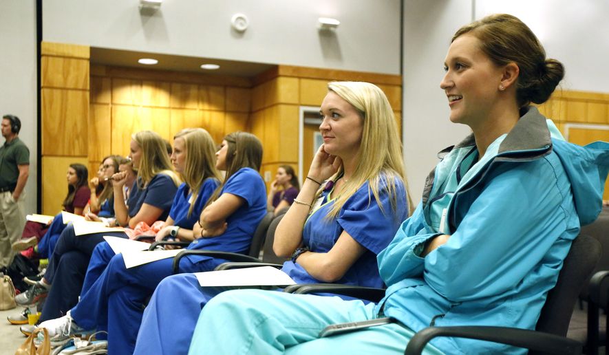 University of Mississippi Medical School students laugh as Jeffrey S. Vitter, makes a joke during a visit to the Jackson, Miss., campus, Wednesday, Oct. 28, 2015. (AP Photo/Rogelio V. Solis)  **FILE**