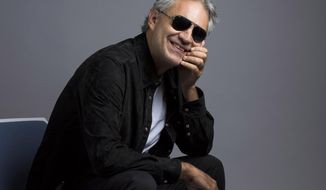In this Oct. 29, 2015 photo, Andrea Bocelli poses for a portrait in New York. Bocelli has released an album, “Cinema,” which includes a duet with pop star Ariana Grande. (Photo by Drew Gurian/Invision/AP)