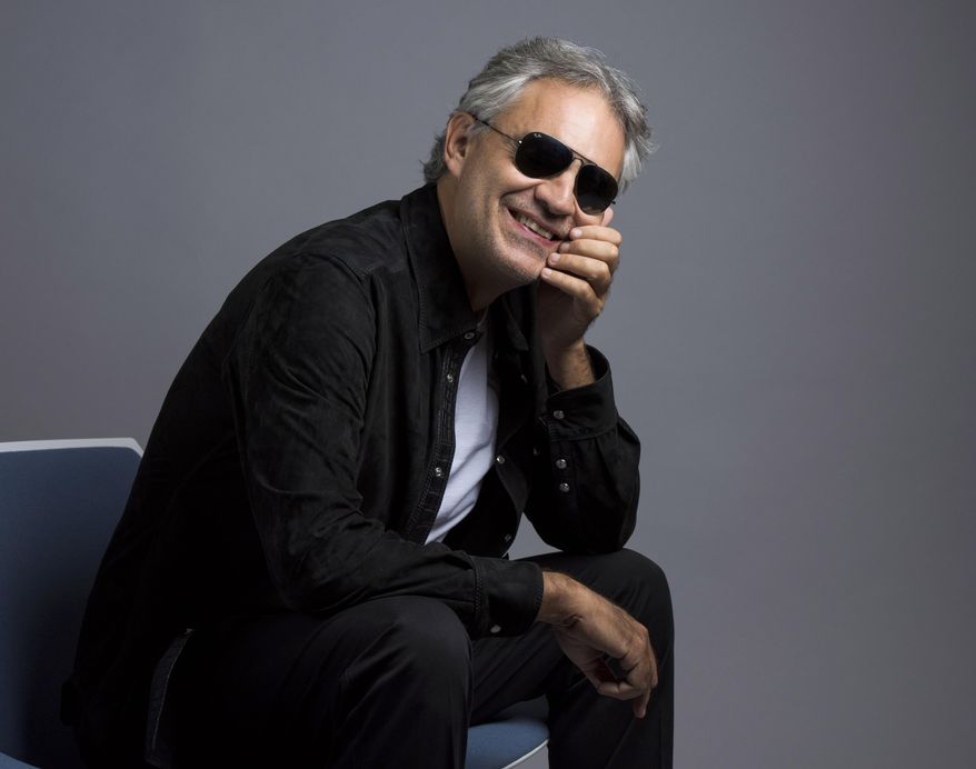 In this Oct. 29, 2015 photo, Andrea Bocelli poses for a portrait in New York. Bocelli has released an album, “Cinema,” which includes a duet with pop star Ariana Grande. (Photo by Drew Gurian/Invision/AP)