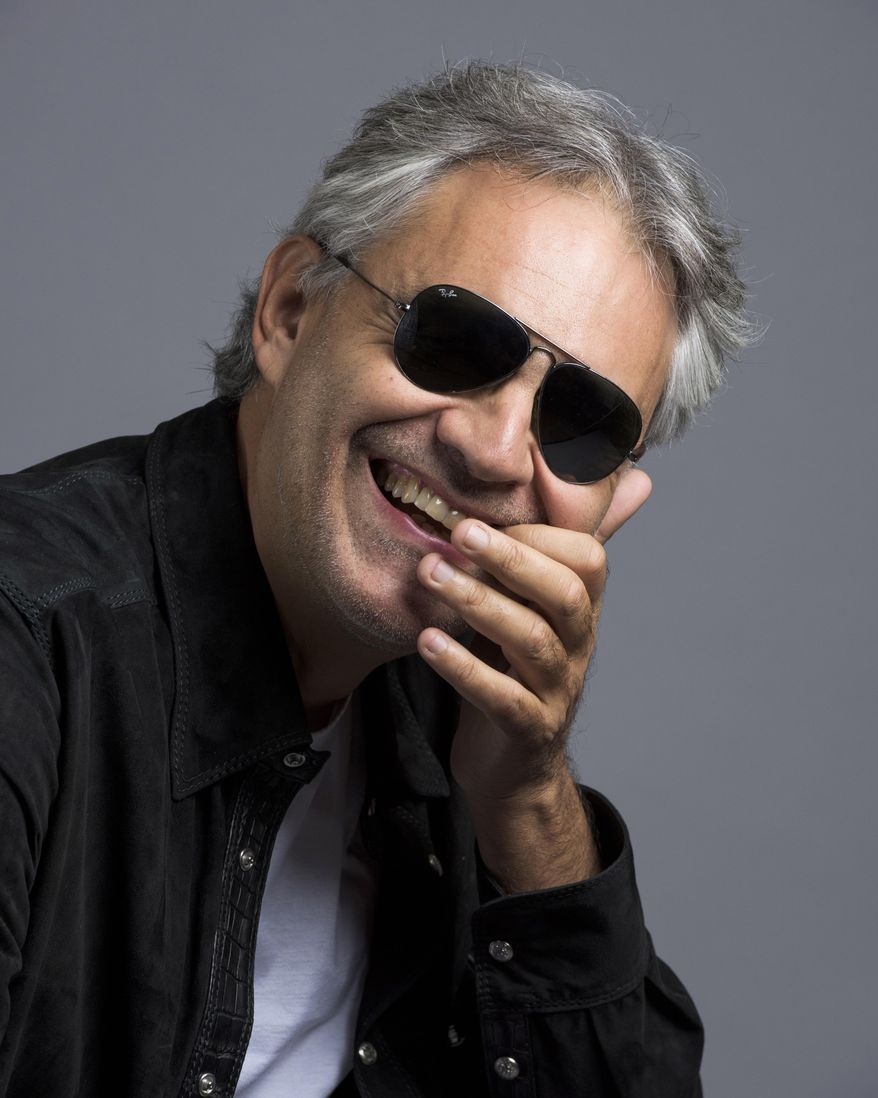 In this Oct. 29, 2015 photo, Andrea Bocelli poses for a portrait in New York. Bocelli has released an album, “Cinema,” which includes a duet with pop star Ariana Grande. (Photo by Drew Gurian/Invision/AP)