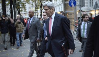 Secretary of State John Kerry walks to the Hotel Bristol in Vienna, Austria, Thursday, Oct. 29, 2015, for a meeting with the Iranian Foreign Minister Javad Zarif. Kerry and other leaders are in Vienna to discuss solutions to the conflict in Syria. (Brendan Smialowski/Pool via AP)
