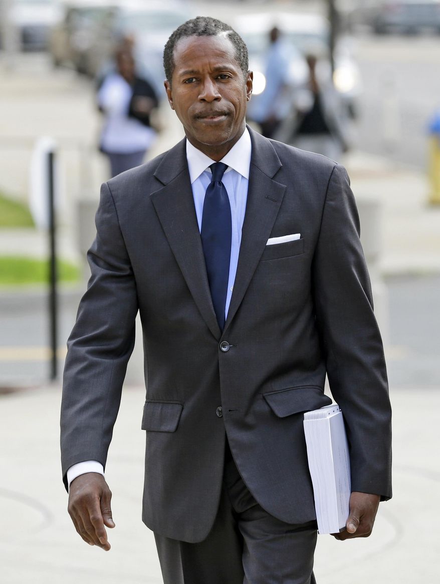 FILE- In this July 1, 2015, file photo, former Democratic state Sen. Malcolm Smith arrives to federal court in White Plains, N.Y. On Friday, Oct. 30, 2015, Smith’s lawyer sought a month long delay so Smith could hear judges, an ex-inmate and correctional experts discuss “what a prison sentence really means” before an attorneys’ group Nov. 17. (AP Photo/Seth Wenig, File)