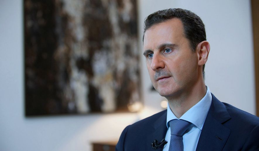 Syrian President Bashar Assad speaks during an interview with the Iran&#39;s Khabar TV, in Damascus, Syria., in this Oct. 4, 2015, file photo released by the Syrian official news agency SANA. (SANA via AP, File)