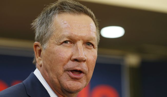 John Kasich has made his record of balancing the federal budgets when he was a congressman and of balancing the budget in Ohio the cornerstone of his campaign. He has promised to do it again if elected president and to do it in eight years. (Associated Press)