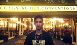 This August 2014 photo provided by Shu Chien shows her son Moshe Kai Cavalin at the DEF CON 23 hacker&#x27;s conference in Las Vegas. Cavalin, of San Gabriel, Calif., earned a bachelor’s in math from UCLA at age 15, and is taking online classes through Brandeis University, near Boston, towards a master’s in cybersecurity. He’s also working for NASA, where he is developing aircraft tracking technology. (Shu Chien via AP)