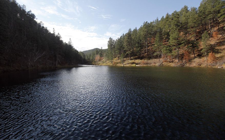 An Oct. 27, 2015 photo shows the spot between Vanocker and Bulldog canyons known as the Sturgis City Dams. The nonprofit group Black Hills Trails wants to build a system of trails down to the dams. The dams are Sturgis city property but have been closed to the public for many years. The city of Sturgis is developing plans to open a pristine area south of the city to non-motorized uses including hiking, fishing and primitive camping. (Chris Huber/Rapid City Journal via AP)