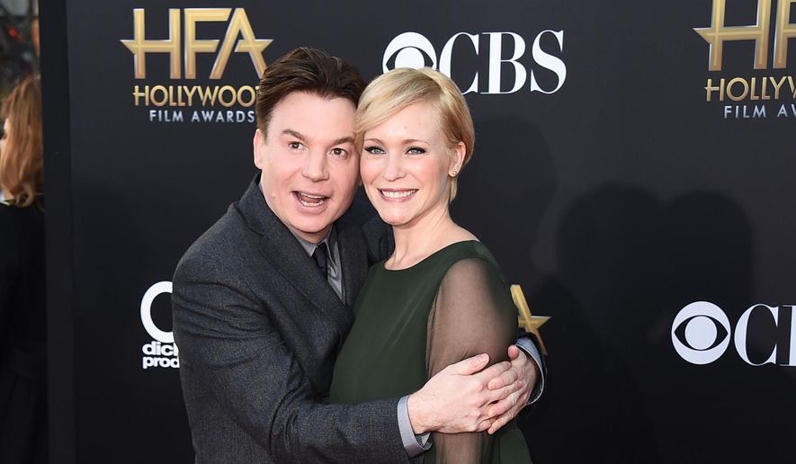 Mike Myers, left, and Kelly Tisdale arrive at the Hollywood Film Awards at the Palladium in Los Angeles, in this Nov. 14, 2014, file photo. A spokeswoman for Myers said that Kelly gave birth Monday, Nov. 2, 2015, to their daughter Paulina Kathleen in New York City. (Photo by Jordan Strauss/Invision/AP, FIle)