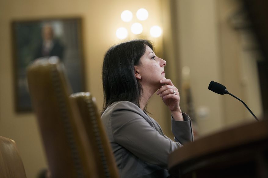 Dr. Mandy Cohen, chief of staff, Centers for Medicare and Medicaid Services, testifies on Capitol Hill in Washington, Tuesday, Nov. 3, 2015, before the House Health subcommittee hearing on the state of the health care CO-OP Program. The Obama administration defended the health care law’s struggling insurance co-ops Tuesday, suggesting to Congress that cutbacks demanded by lawmakers themselves put added pressure on an altruistic alternative to mega-insurers. (AP Photo/Cliff Owen)