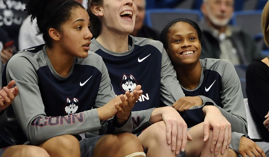 Connecticut’s Gabby Williams, left, Breanna Stewart, center, and Moriah Jefferson, react during the fourth quarter of an NCAA college basketball exhibition game against Lubbock Christian, Monday, Nov. 2, 2015, in Hartford, Conn. (AP Photo/Jessica Hill)
