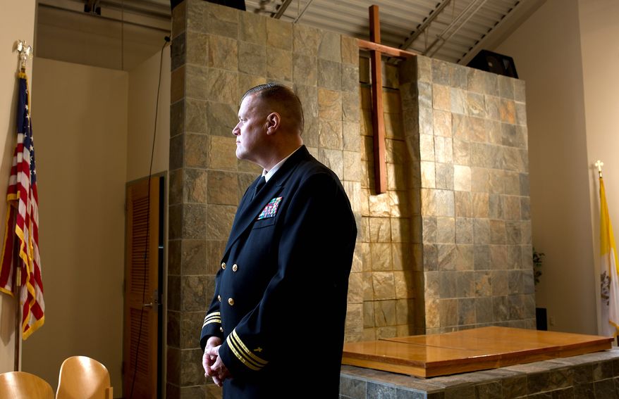 Lt. Cmdr. Wesley J. &quot;Wes&quot; Modder, a Navy chaplain, is shown at his chapel at his new duty station in San Diego. (Earnie Grafton/Special to The Washington Times)