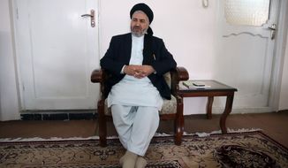 Afghanistan&#39;s Minister of Refugees and Repatriation Hossain Alemi Balkhi talks during an interview with The Associated Press at his home in Kabul, Afghanistan, in this Thursday, Oct. 29, 2015, file photo. An estimated 120,000 Afghans have left for Europe so far this year, according to Balkhi, He expects that number to reach 160,000 by the end of the year, four times the number who departed in 2013. (AP Photos/Massoud Hossaini)

