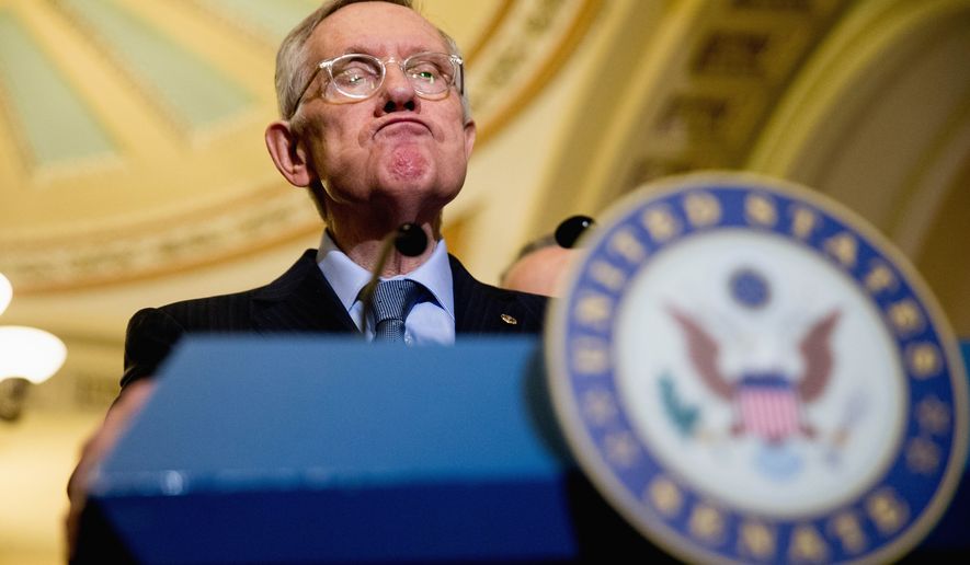 Senate Minority Leader Harry Reid, Nevada Democrat, pauses during a news conference on Capitol Hill in Washington on Nov. 3, 2015, following a Senate Democratic policy luncheon. (Associated Press) **FILE**