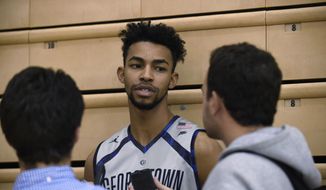 In this photo taken Oct. 27, 2015, Georgetown University men&#x27;s basketball player Isaac Copeland speaks with reporters at McDonough Arena in Washington. Once again, Georgetown&#x27;s season ended early, during the NCAA Tournament&#x27;s opening week and, once again, against a lower-seeded opponent.  (AP Photo/Susan Walsh) **FILE**