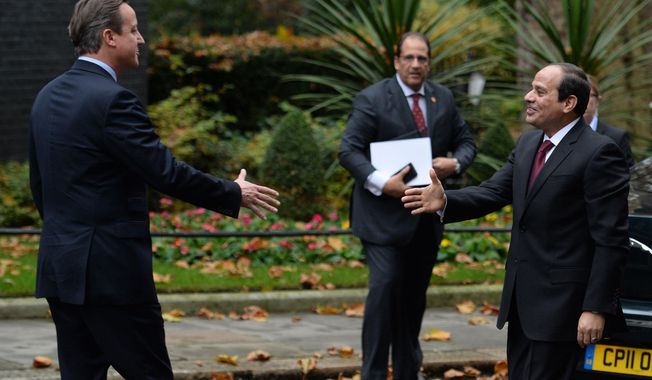 Britain&#x27;s Prime Minister David Cameron, left, greets Egyptian president Abdel Fatah el-Sisi at 10 Downing Street in London ahead of their meeting Thursday Nov. 5, 2015. British Prime Minister David Cameron declared Thursday it was &amp;quot;more likely than not&amp;quot; that a bomb brought down a Metrojet flight packed with Russian vacationers — a scenario that officials from Russia and Egypt tried to dismiss as premature speculation. Cameron said he had grounded all flights to and from Egypt&#x27;s Sinai Peninsula, stranding thousands of British tourists at the Red Sea resort of Sharm el-Sheikh, because of &amp;quot;intelligence and information&amp;quot; indicating that a bomb was the likely culprit in the crash Saturday that killed 224 people.  (Stefan Rousseau/PA via AP) UNITED KINGDOM OUT