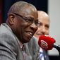 Dusty Baker, left, smiles, with general manager Mike Rizzo, during a news conference to present Baker as the new manager of the Washington Nationals baseball team, Thursday, Nov. 5, 2015, in Washington. (AP Photo/Alex Brandon)