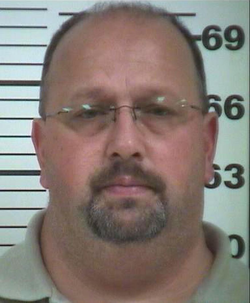 In this undated booking photo released by Platte County, Missouri prosecutor's office, Darren Paden is seen. Platte County prosecuting attorney Eric Zahnd issued a news release last week listing the names and occupations of 16 people in Dearborn who had either written letters or testified on behalf of 52-year-old Darren Paden, who was sentenced Oct. 30 to 50 years in prison for statutory sodomy. Paden’s defense attorney says Zahnd’s actions against those who wrote letters will have a chilling effect on others who want to vouch for a friend or family member who commits a crime. (Platte County Prosecutor's Office via AP)