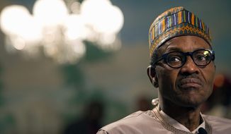 Six months into his term, Nigerian President Muhammadu Buhari has still not finished nominating people to serve in his Cabinet. (Associated Press)