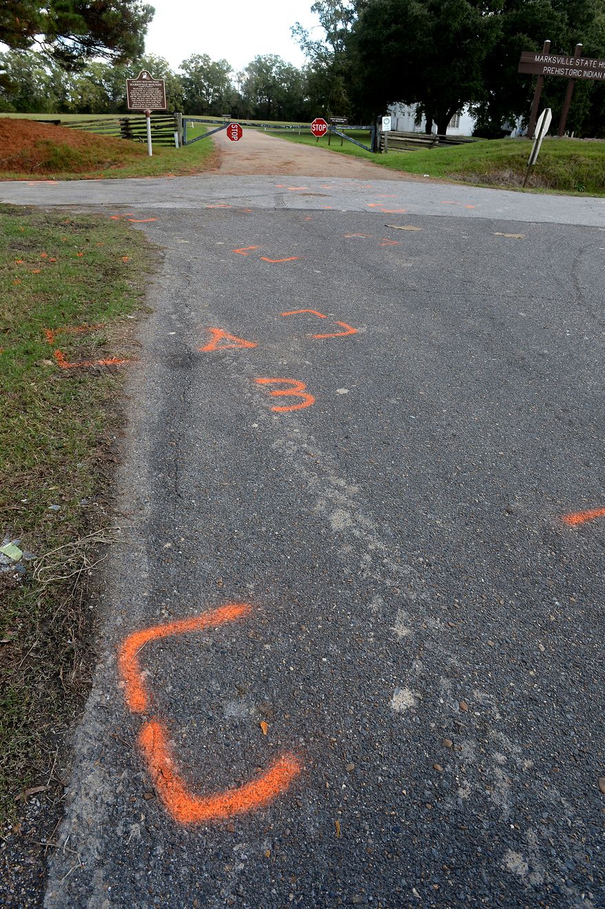 This Wednesday, Nov. 4, 2015 photo shows the intersection near the Marksville State Historical Site where Marksville Ward Marshals chased a man in his car Tuesday night and pinned him in before the man backed into one of their vehicles and Marshals opened fire. A six-year-old boy, allegedly the son of the driver, was hit and killed in the gunfire. The driver was wounded. (AP Photo/The Baton Rouge Advocate,Patrick Dennis)