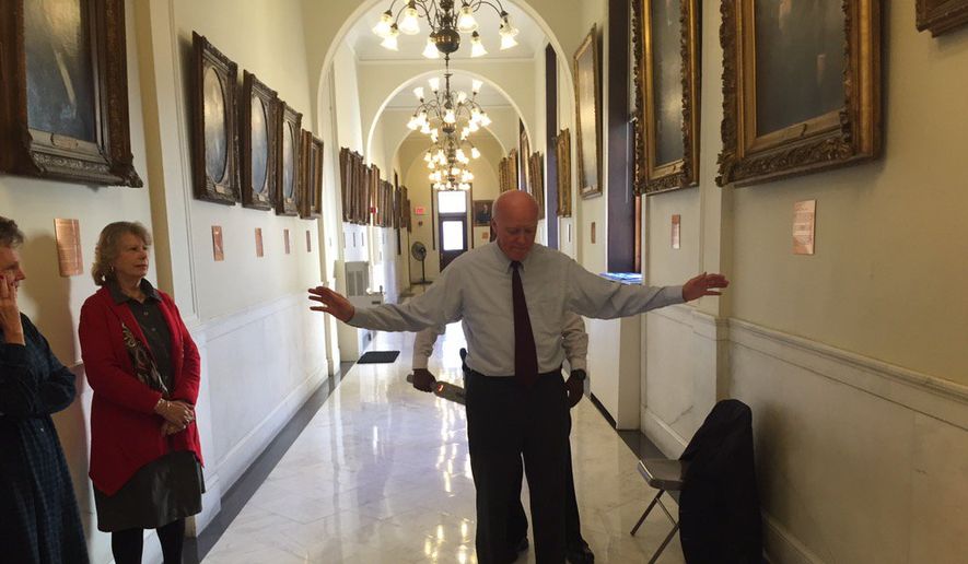 In this 2015 photo, New Hampshire Secretary of State Bill Gardner is shown subjected to a metal detector wand before entering his own office when Hillary Rodham Clinton was filing for the state primary. (Photo credit: Josh McElveen, WMUR-TV) **FILE**