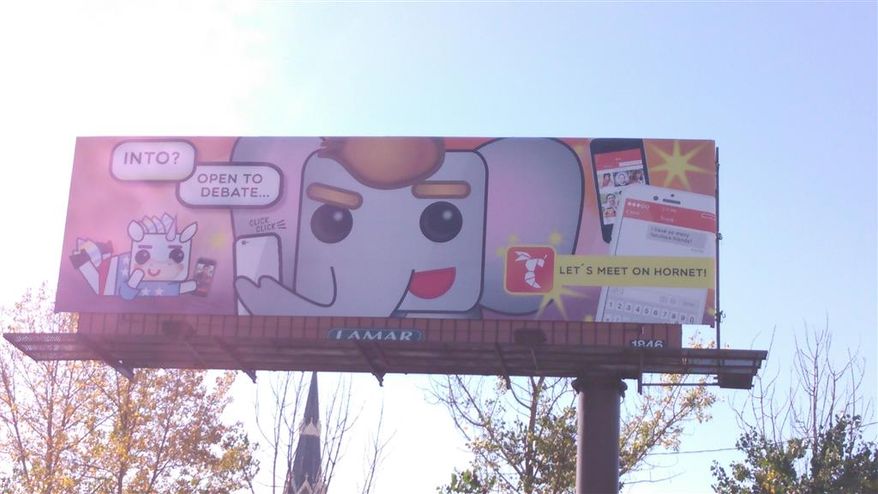 Hornet, a gay dating and social network, put up a billboard in downtown Milwaukee ahead of the Nov. 10 GOP presidential debate, near the debate venue at the Milwaukee Theater. The billboard features a cartoon unicorn and elephant purported to be homosexuals.