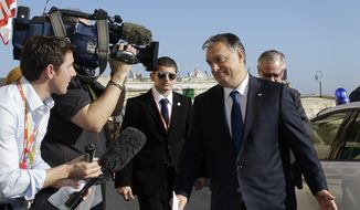 Hungarian Prime Minister Viktor Orban arrives on the occasion of a summit on migration in Valletta, Malta, Thursday, Nov. 12, 2015. (AP Photo/Antonio Calanni)
