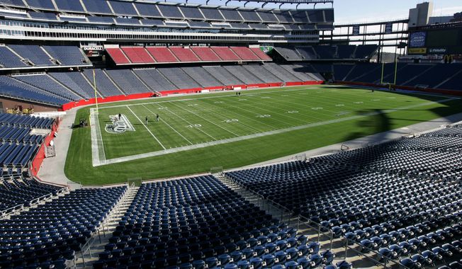 Empty seats surround the new synthetic turf of the football field at Gillette Stadium, in Foxborough, Mass., Tuesday, Nov. 21, 2006. (AP Photo/Steven Senne) ** FILE **
