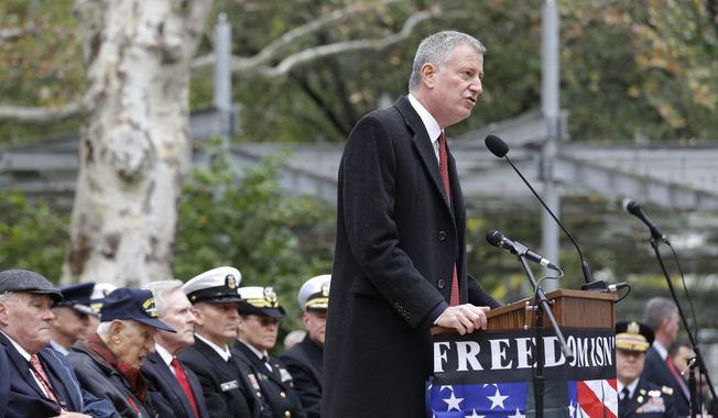 New York City Mayor Bill de Blasio speaks during a ceremony before the start of the annual Veteran&#x27;s Day parade in New York, Wednesday, Nov. 11, 2015.  (AP Photo/Seth Wenig) ** FILE **