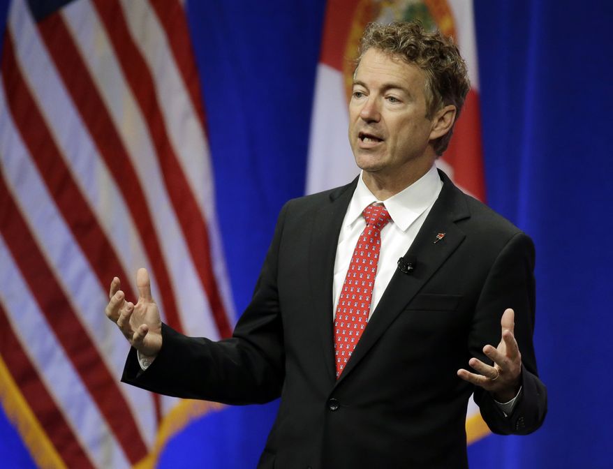 Republican presidential candidate Sen. Rand Paul, R-Ky., addresses the Sunshine Summit in Orlando, Fla., Saturday, Nov. 14, 2015. (AP Photo/John Raoux)