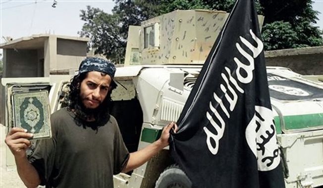 This undated image made available in the Islamic State&#x27;s English-language magazine Dabiq, shows Belgian national Abdelhamid Abaaoud. Abaaoud, the child of Moroccan immigrants who grew up in the Belgian capital’s Molenbeek-Saint-Jean neighborhood, was identified by French authorities on Monday Nov. 16, 2015, as the presumed mastermind of the terror attacks last Friday in Paris that killed over a hundred people and injured hundreds more. (Militant Photo via AP)