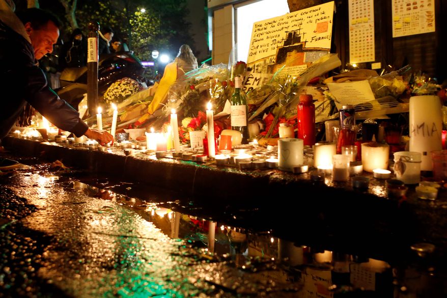La Belle Equipe restaurant in Paris was one of the sites of the terrorist attacks Friday. U.S. and European intelligence agencies are hunting for anyone connected to the deadly assaults. (Associated Press)
