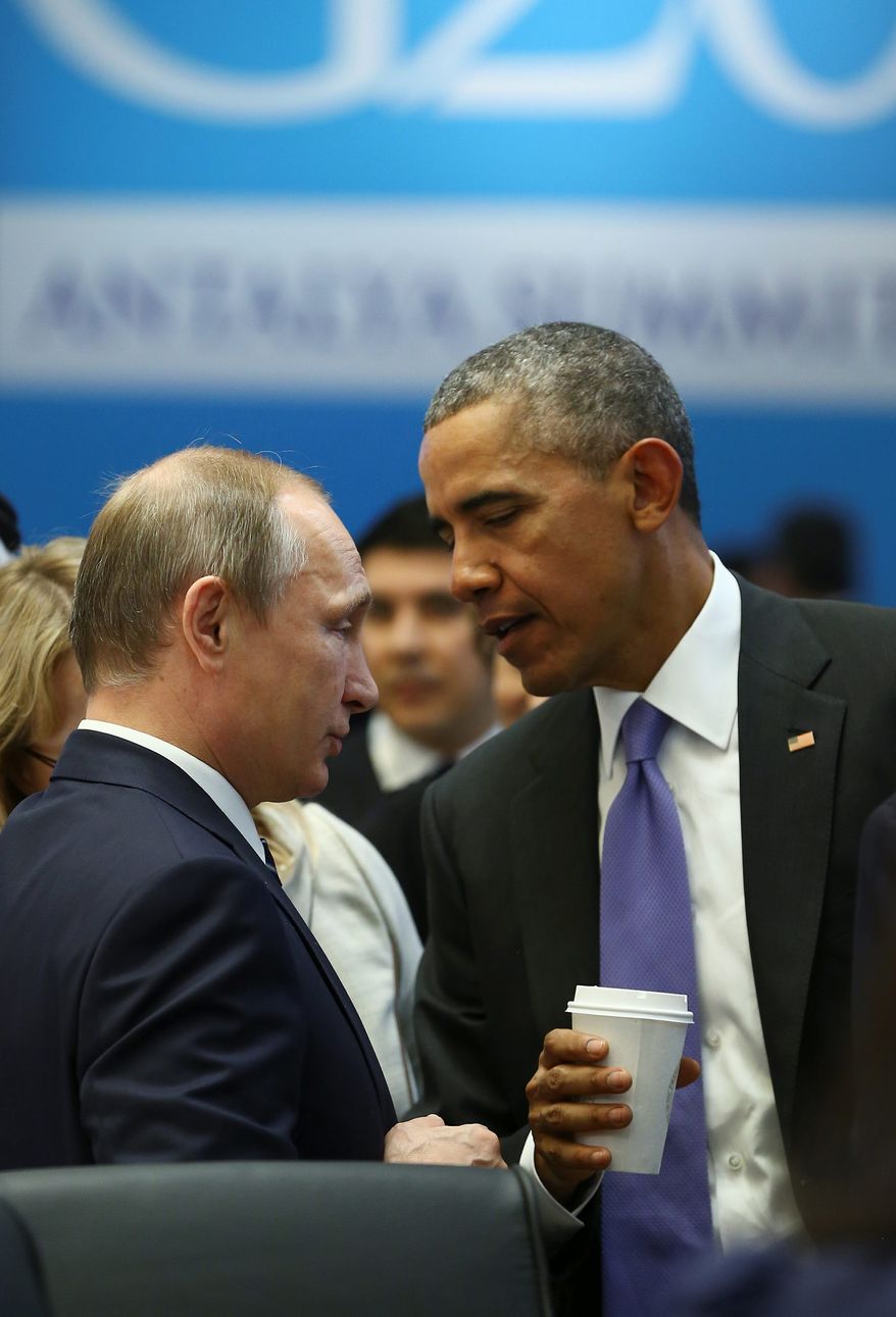 President Obama talks with Russian President Vladimir Putin prior to a session of the G-20 summit in Turkey. (Associated Press)