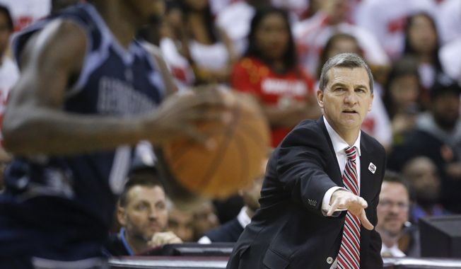 Maryland head coach Mark Turgeon directs his players during an NCAA college basketball game against Georgetown, Tuesday, Nov. 17, 2015, in College Park, Md. (AP Photo/Patrick Semansky)