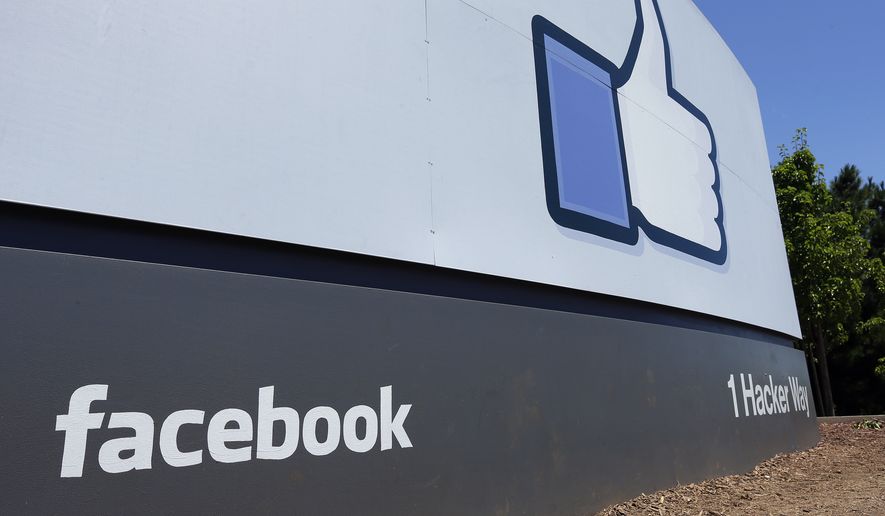 This July 16, 2013, file photo shows a sign at Facebook headquarters in Menlo Park, Calif. (AP Photo/Ben Margot, File)
