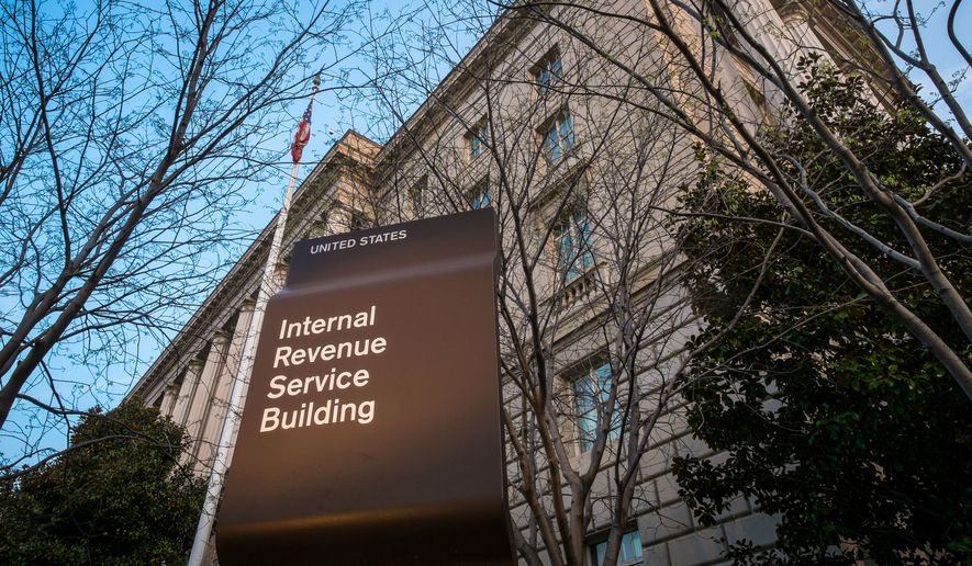 While the average taxpayer faced a less than 1 percent chance of an IRS audit in the 2014 fiscal year, those making $200,000 had twice that rate, and the higher the income, the more likely the auditors were to take a look. (Associated Press)
