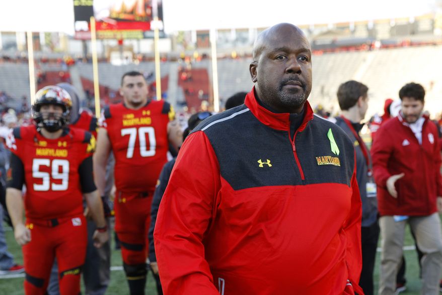 Maryland interim head coach Mike Locksley walks off the field after an NCAA college football game against Indiana, Saturday, Nov. 21, 2015, in College Park, Md. (AP Photo/Patrick Semansky)